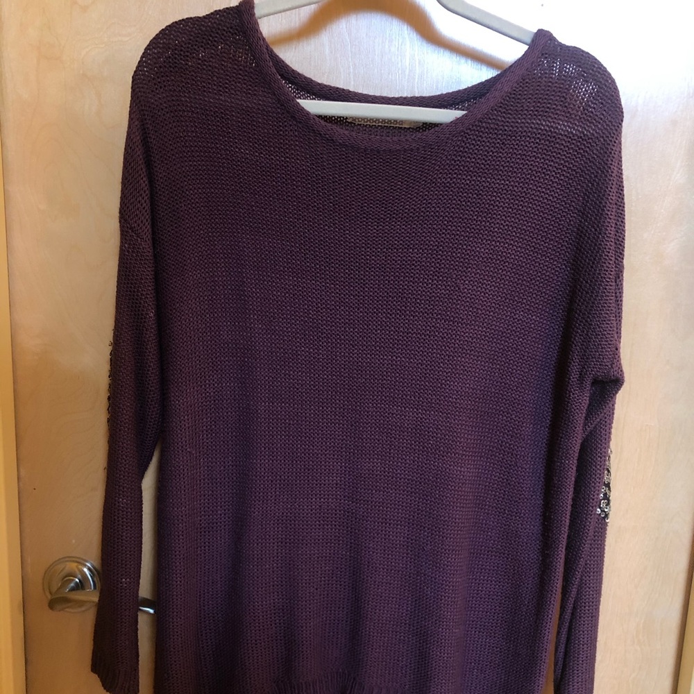 Long sweater with embellished elbow patches